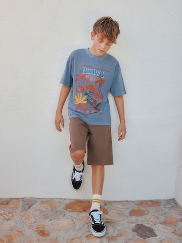 T-Shirt Next en bleu : devant