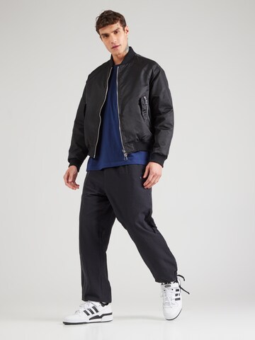 Loosefit Pantalon 'Firebird' ADIDAS ORIGINALS en noir