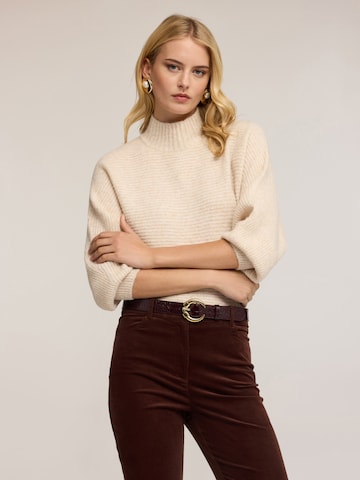 Pull-over MOTIVI en beige : devant