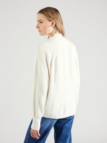 Pull-over Tommy Jeans en blanc