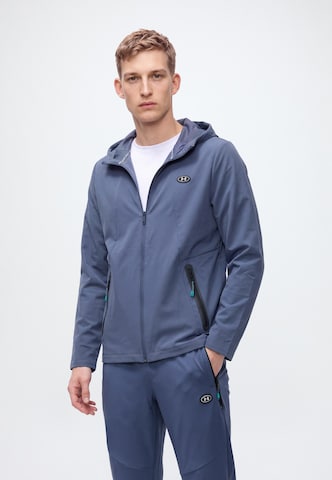 UNDER ARMOUR - Tapered Pantalón deportivo 'Utility' en gris