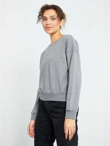 Sweat-shirt Tommy Life en gris