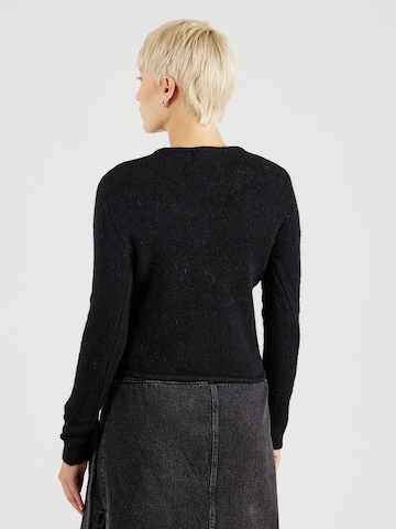 Geacă tricotată de la Gina Tricot pe negru