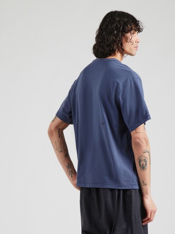 NIKE Performance shirt 'HERITAGE' in Blue