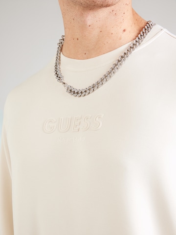 GUESS Μπλούζα φούτερ σε μπεζ