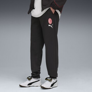 PUMA Tapered Sportbroek in Zwart: voorkant