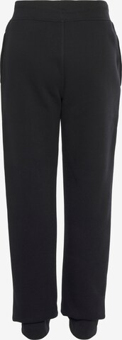 Champion Authentic Athletic Apparel Tapered Trousers in Black