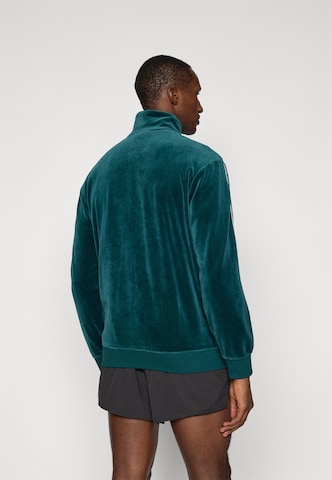 PUMA Sweatjacka 'Ess Elevated' i grön