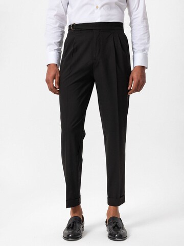 Antioch Tapered Pleat-Front Pants in Black: front