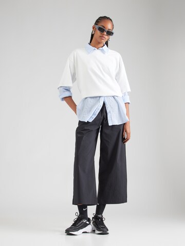 new balance - Pierna ancha Pantalón en negro