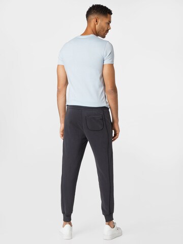 Calvin Klein Jeans Tapered Hose in Schwarz