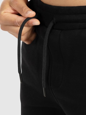 Regular Pantalon de sport ' Chaise ' Smilodox en noir