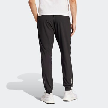 ADIDAS SPORTSWEAR Tapered Sportbyxa i svart
