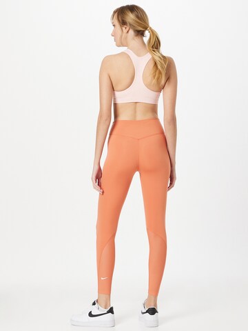 NIKE Skinny Športové nohavice 'One' - oranžová