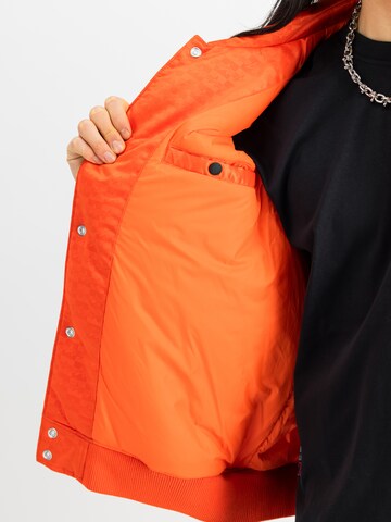 oranžinė ALPHA INDUSTRIES Demisezoninė striukė