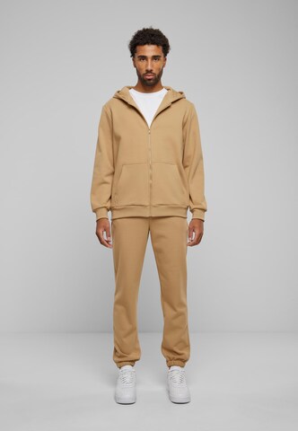 Tapered Pantaloni di Urban Classics in beige