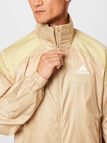 ADIDAS SPORTSWEAR Sportjacke 'Traveer' in Beige