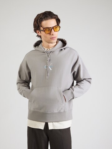 Calvin Klein Jeans Sweatshirt i grå: framsida