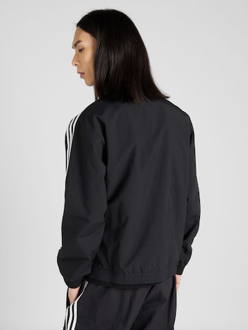 ADIDAS ORIGINALS Jacke in Schwarz