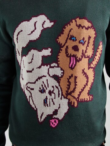Cleptomanicx Pullover 'Cat & Dog' in Grün