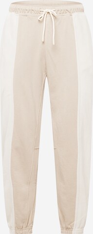 CONVERSE Tapered Pants in Beige: front