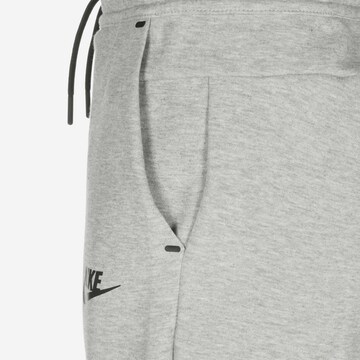 Nike Sportswear Regularen Hlače | siva barva