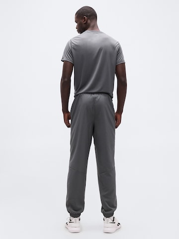 Regular Pantalon de sport Reebok en gris