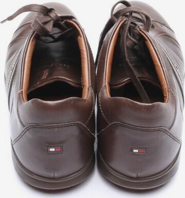 TOMMY HILFIGER Flats & Loafers in 45 in Brown