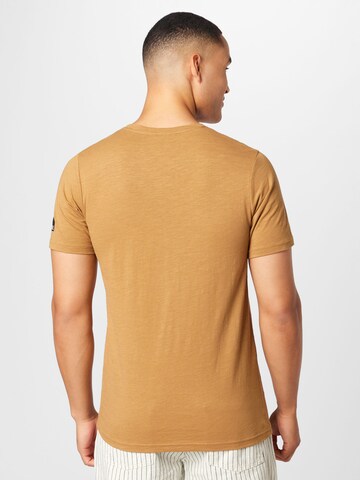 Tricou 'Guti' de la Redefined Rebel pe bej