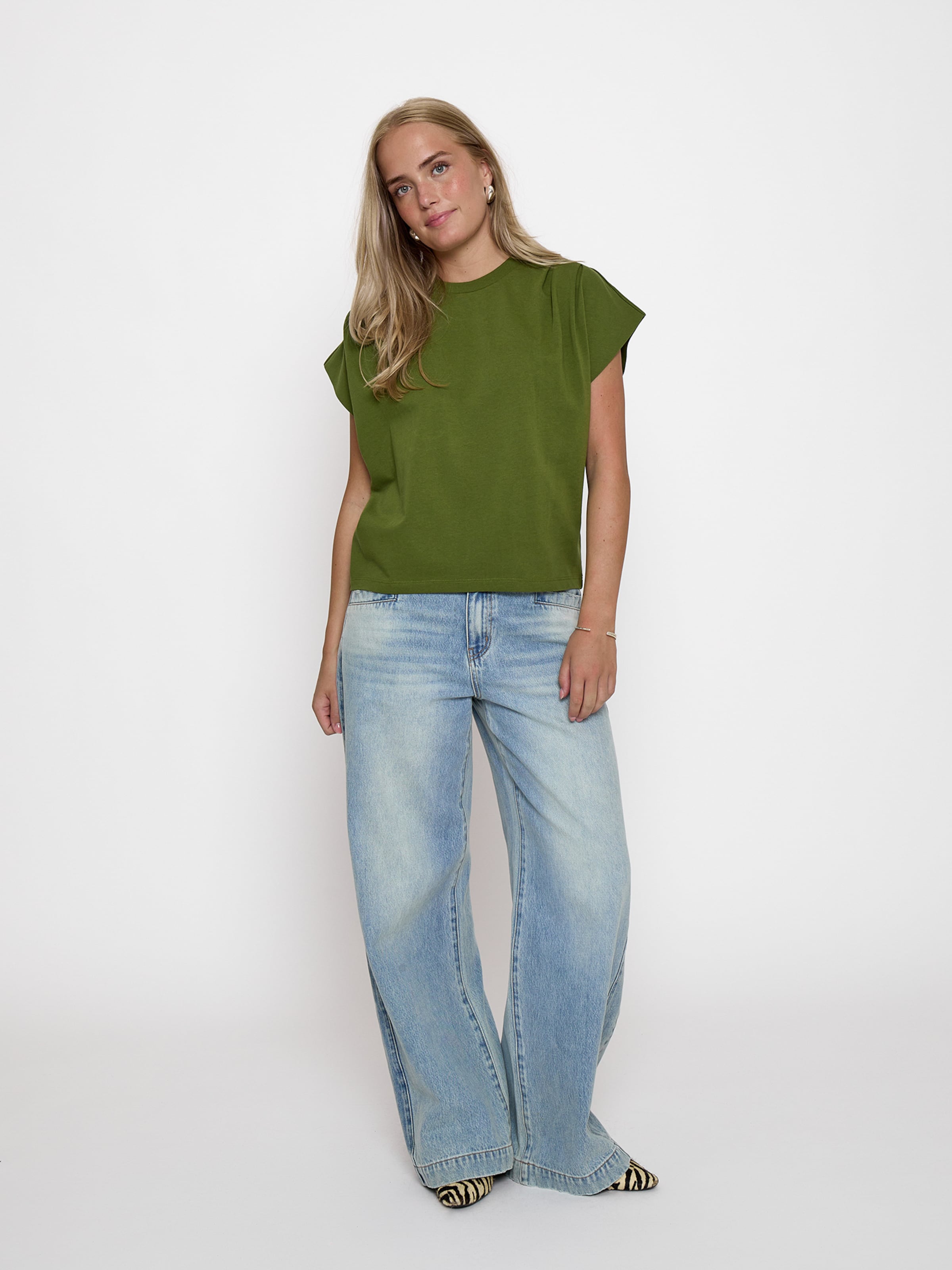 Top di minus in verde
