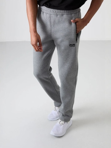 Tommy Life Szabványos Sportnadrágok 'Jogginghose' - szürke