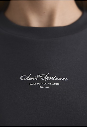 Aim'n - Camiseta funcional en gris