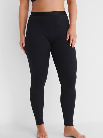 hunkemöller x NA-KD Skinny Leggings 'Zia' in Black: front