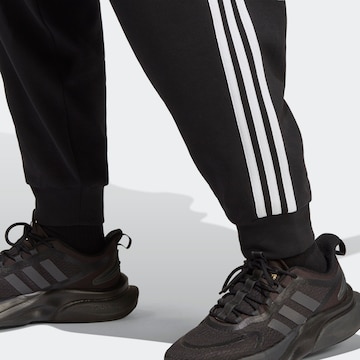 ADIDAS SPORTSWEAR Tapered Παντελόνι φόρμας 'Future Icons 3-Stripes  ' σε μαύρο