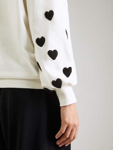 ONLY Carmakoma - Sweatshirt 'CARMACY' em branco