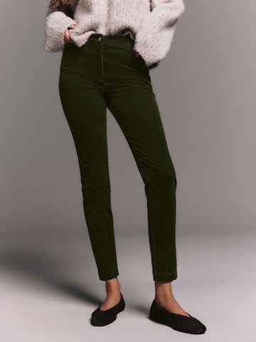 Next Skinny Trousers in Green: front