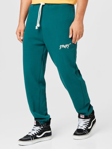 Grimey - Tapered Pantalón 'THE WESTBOUND' en verde: frente