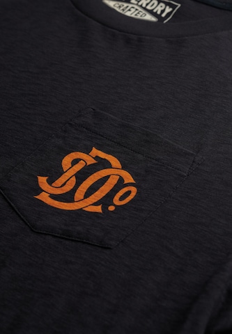 T-Shirt 'The Merchant Store' Superdry en bleu