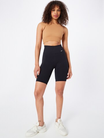 aim'n Skinny Sporthose 'MOTION SEAMLESS' in Schwarz