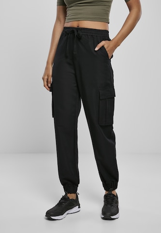 Urban Classics Tapered Cargo Pants in Black: front