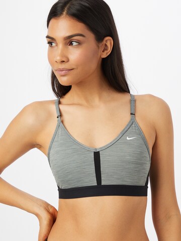 Bustino Reggiseno sportivo 'Indy' di NIKE in grigio: frontale