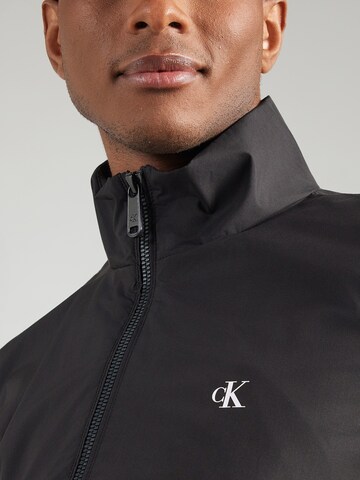 Calvin Klein Jeans Regular Between-season jacket ' ' in Black