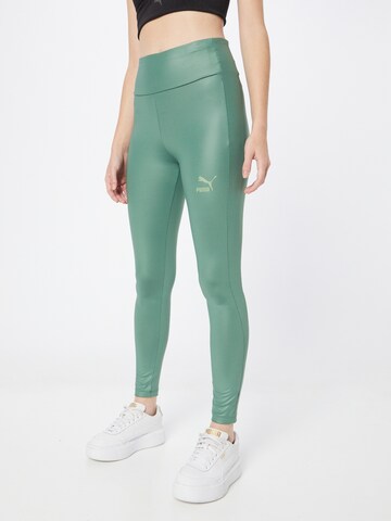 Skinny Pantalon de sport PUMA en vert : devant