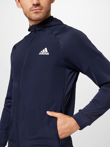 mėlyna ADIDAS SPORTSWEAR Sportinė striukė