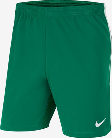 NIKE Workout Pants in Green: front