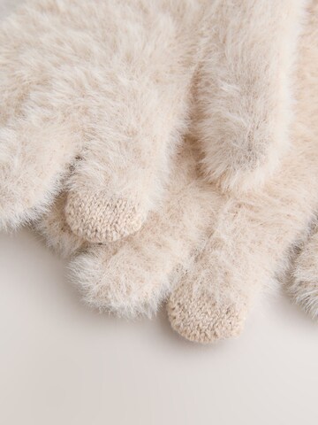 Gants Next en beige