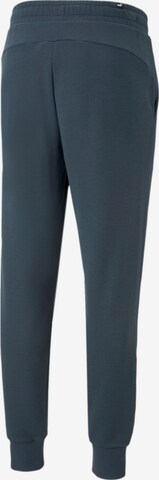 Effilé Pantalon de sport PUMA en bleu