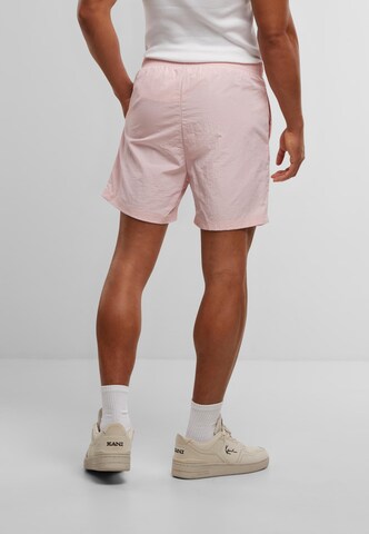 Shorts de bain Karl Kani en rose