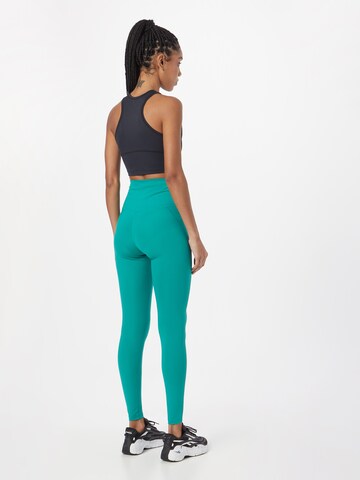 Girlfriend Collective Skinny Workout Pants in Green