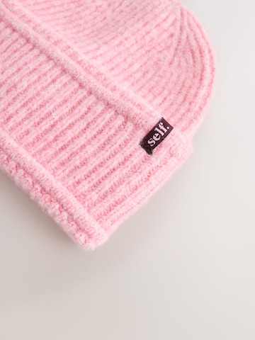 Bonnet self. en rose